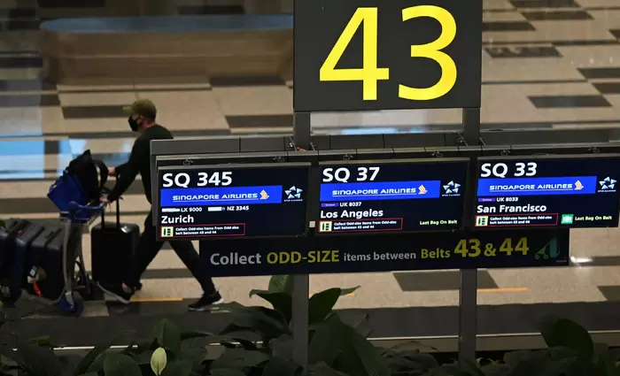 Η εμβολιασμένη Σιγκαπούρη δείχνει το κόστος της επιστροφής στην κανονικότητα